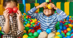 kids playing in ball pit