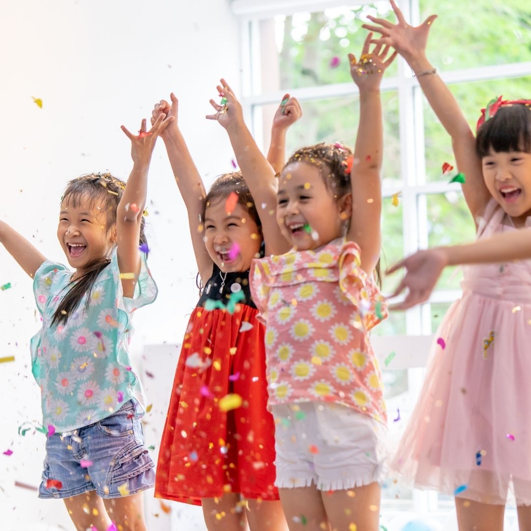 kids playing in confetti