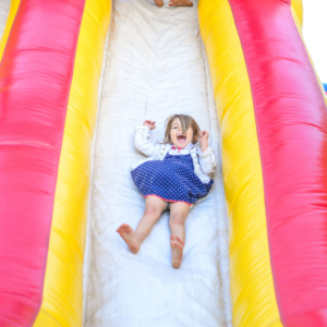 girl sliding down slide