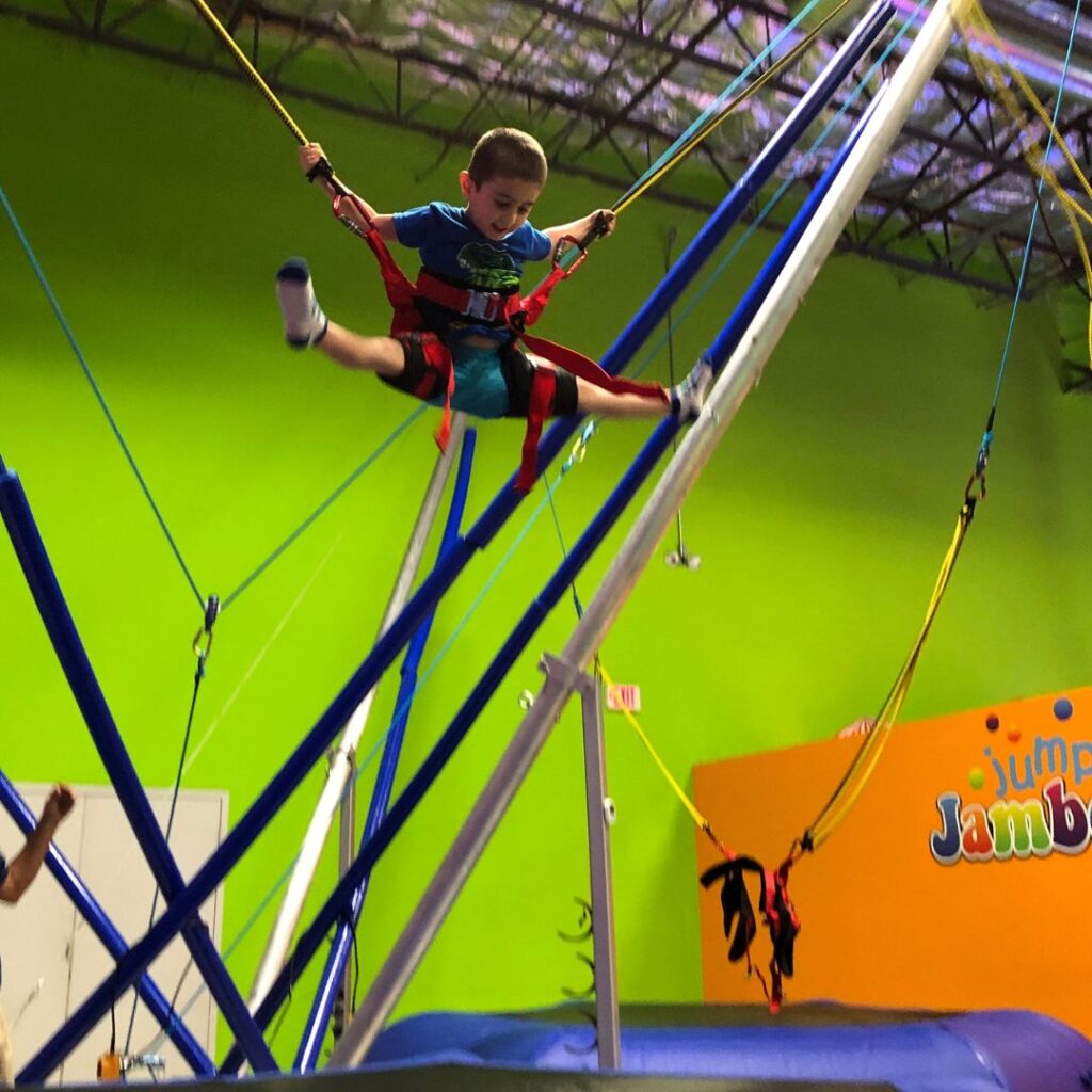 child at inflatable playground