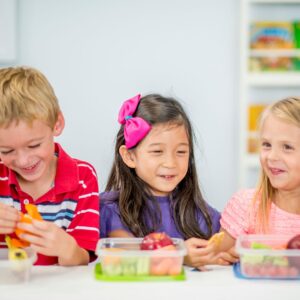 three kids eating 