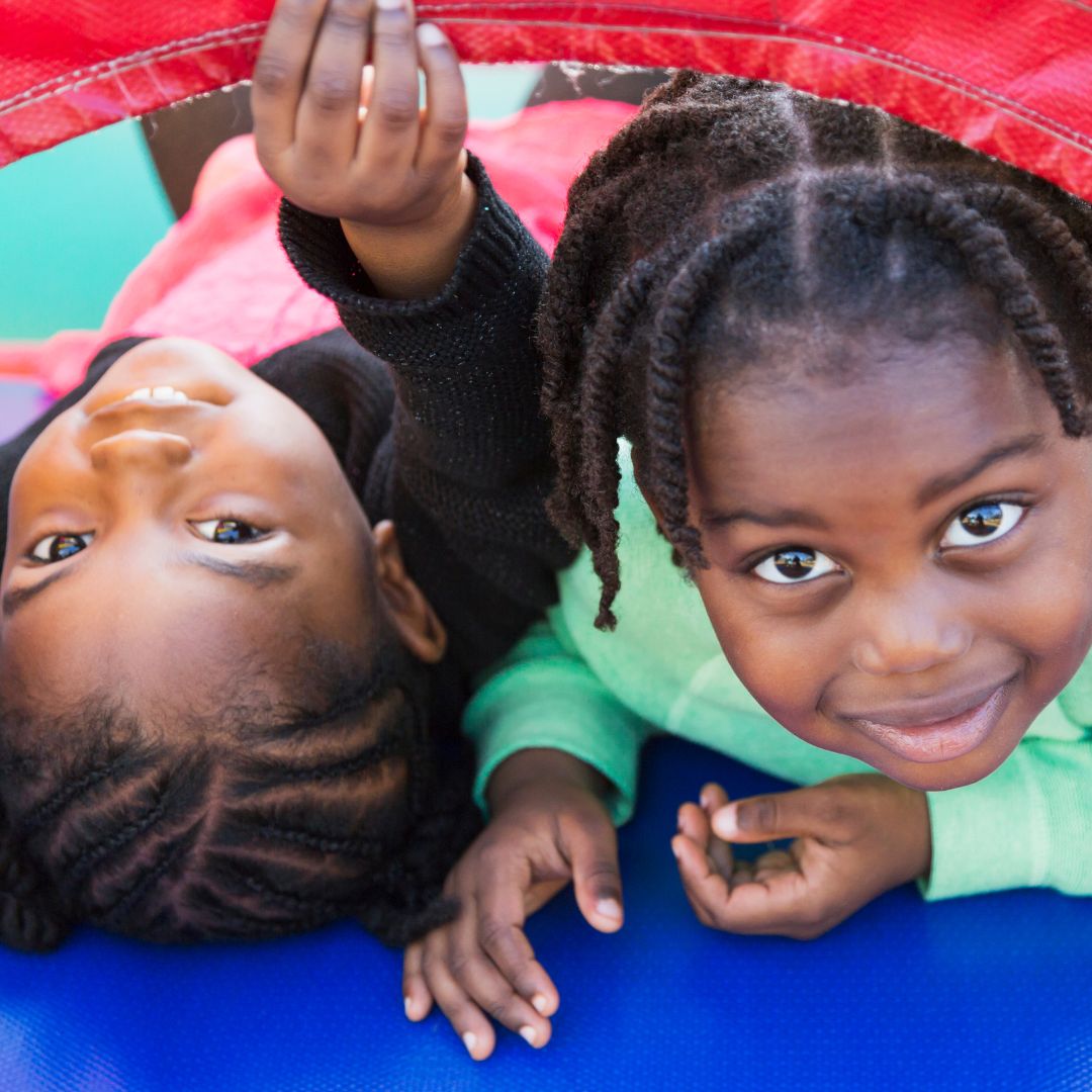 kids playing in bounce house