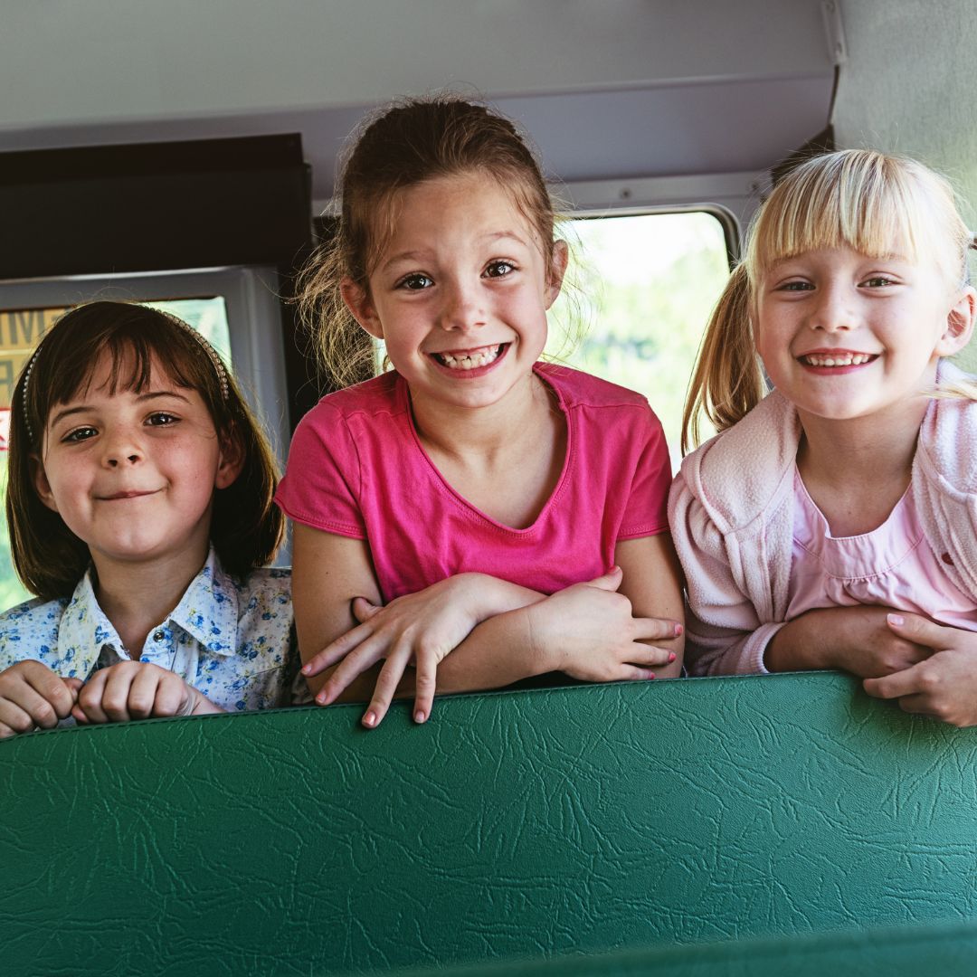 img of kids on a bus