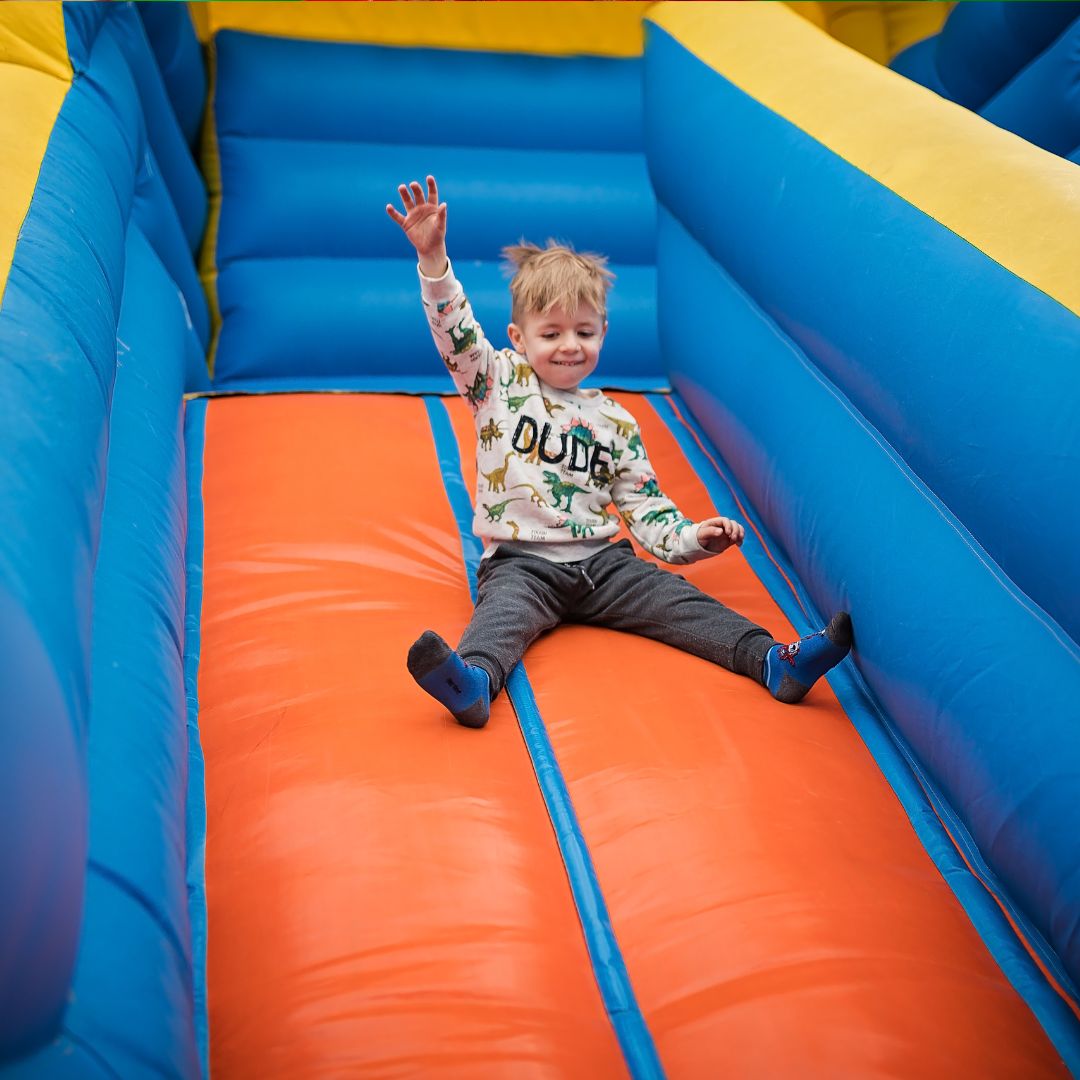 img of a child on a slide