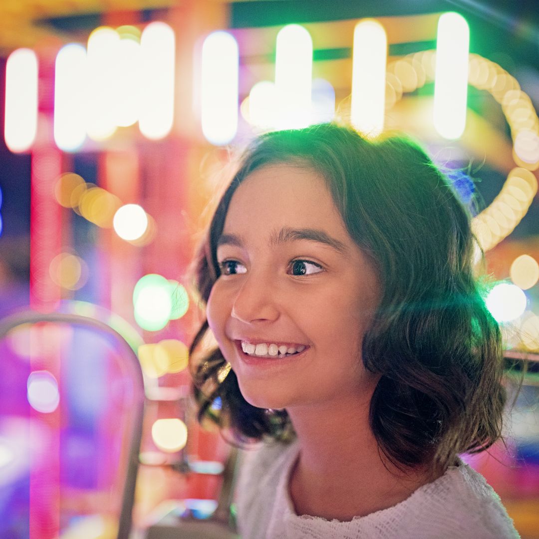 A happy child in an arcade