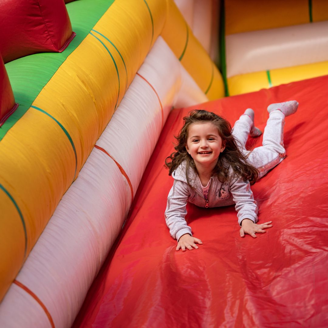 img of a child on a slide